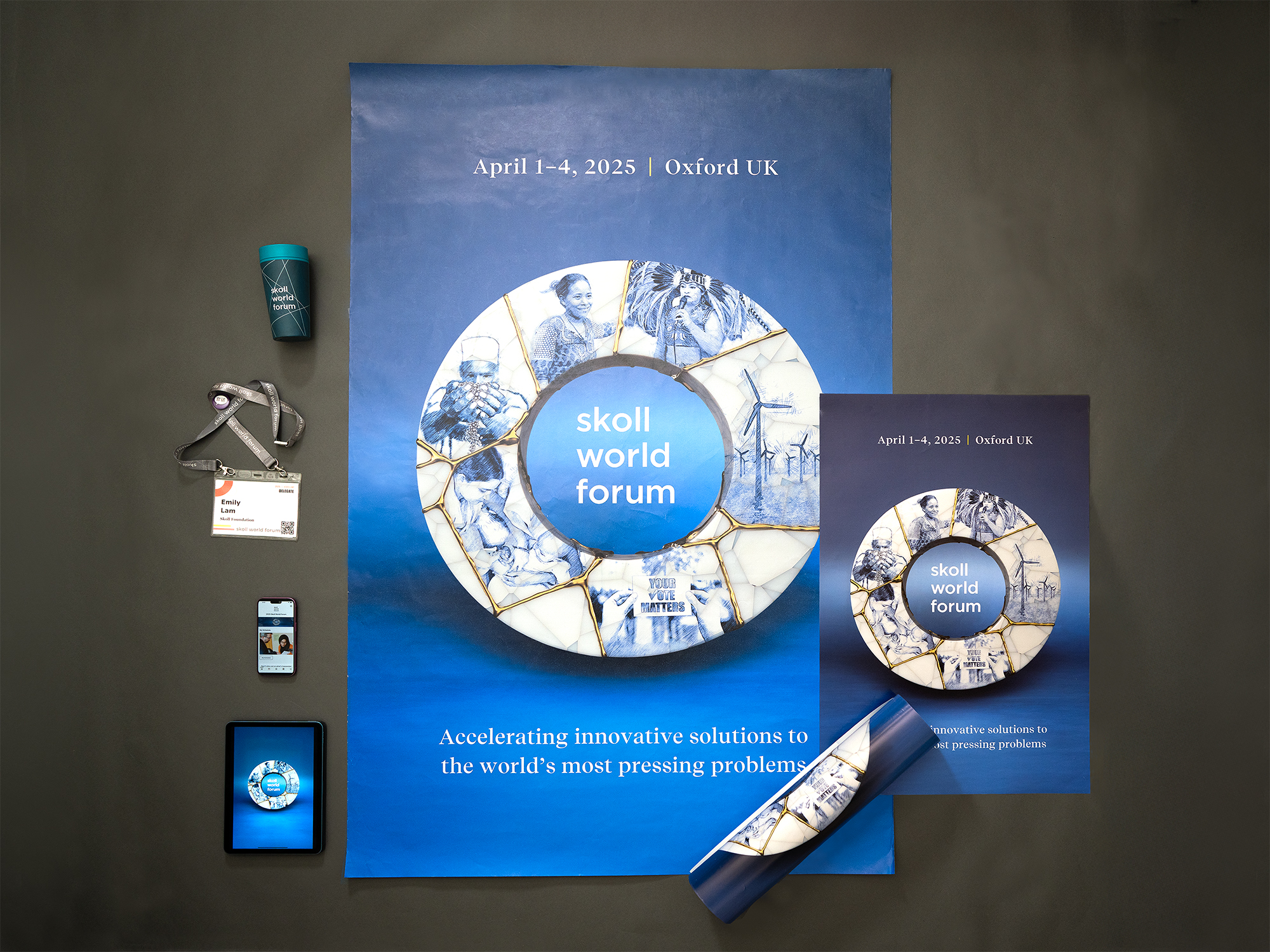 Skoll World Forum 2025 campaign collateral: poster, delegate badge, cup, and mobile and tablet screens